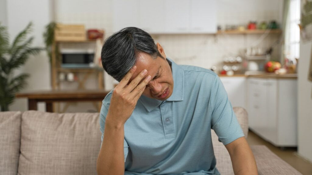 retired male suffering chronic headache